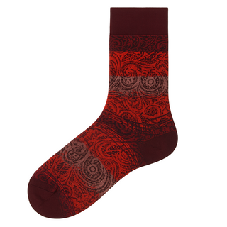 Red patterned paisley mens socks on a white background